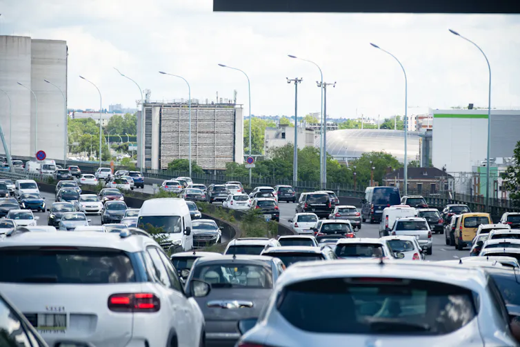 A motorway featuring heavy traffic.