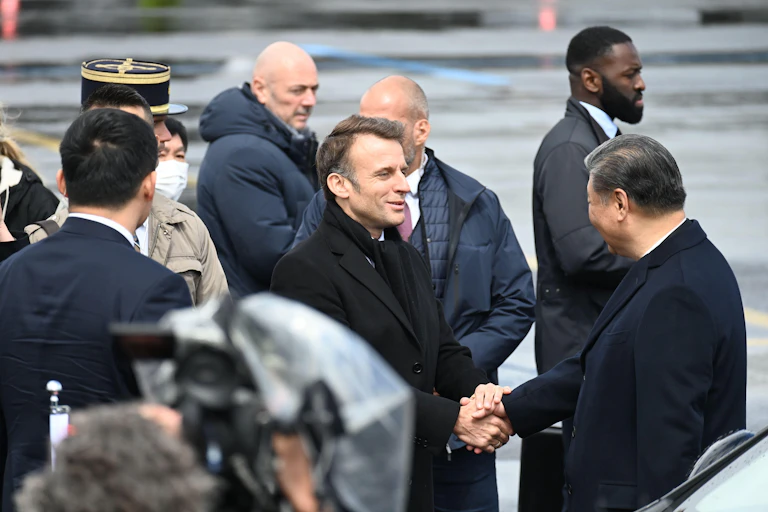 Xi Jinping on a 2024 visit to Paris, shaking hands with French president Emmanuel Macron.