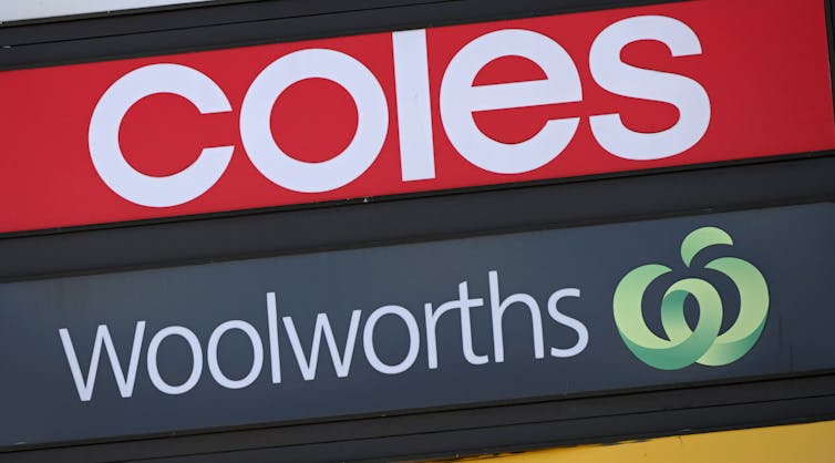 Signage for Coles and Woolworths supermarkets