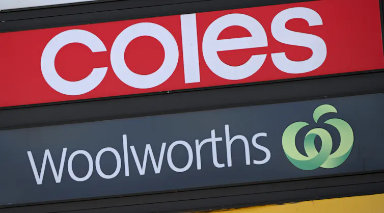 Signage for Coles and Woolworths supermarkets