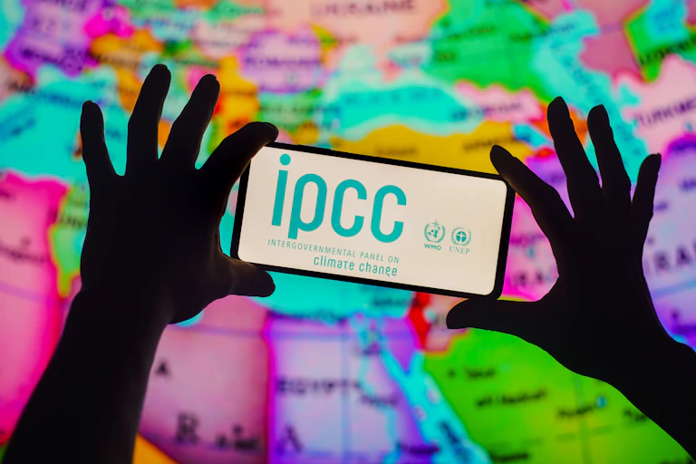 phone screen with IPCC logo above world map