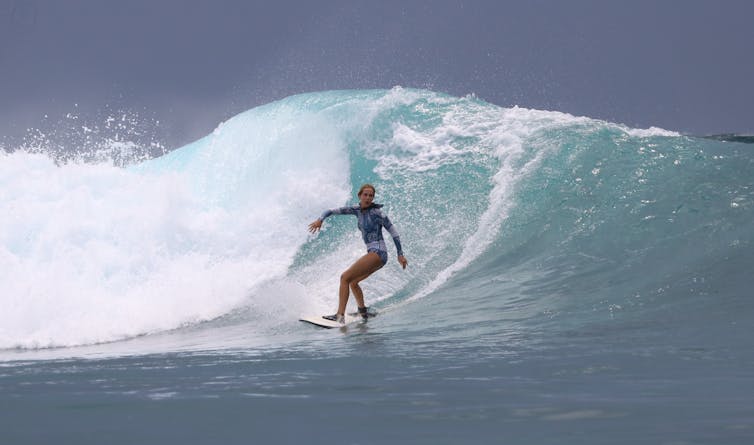 The author riding a wave