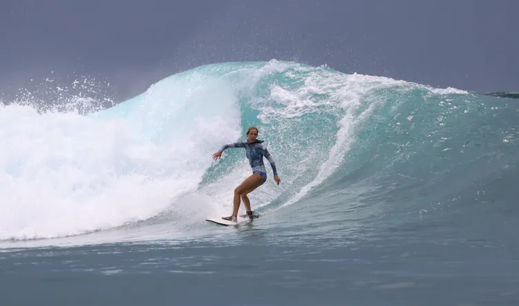 The author riding a wave