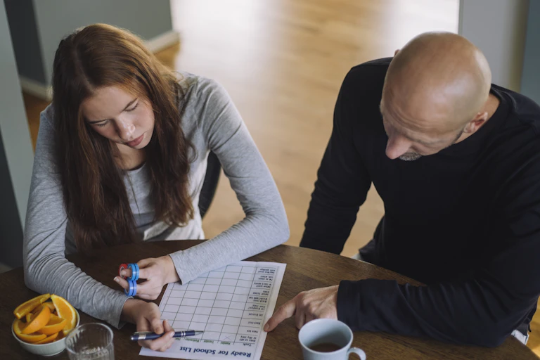 woman and man looking at a checklist