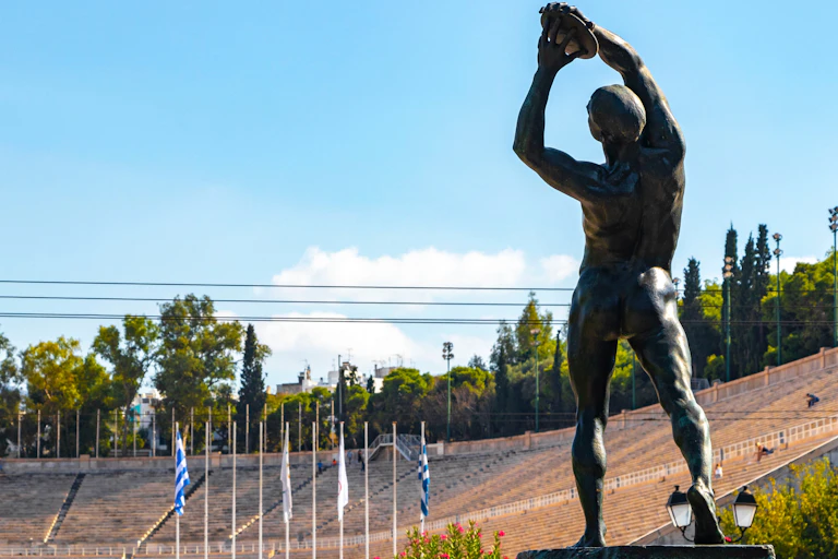 A statue of an athlete at the Panathenaic Stadium in Greece