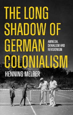A book cover with the words The long shadow of German colonialism and a photo of two adult men in tennis whites on a tennis court with two African boys serving as ballboys.