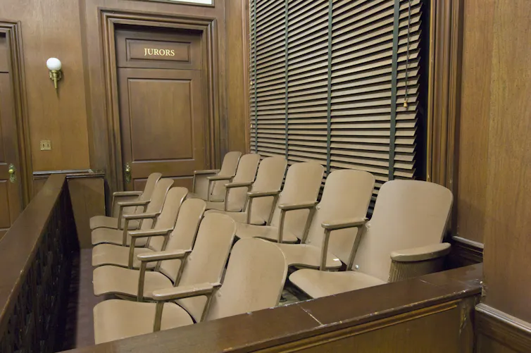 Jury seats in a courtroom.