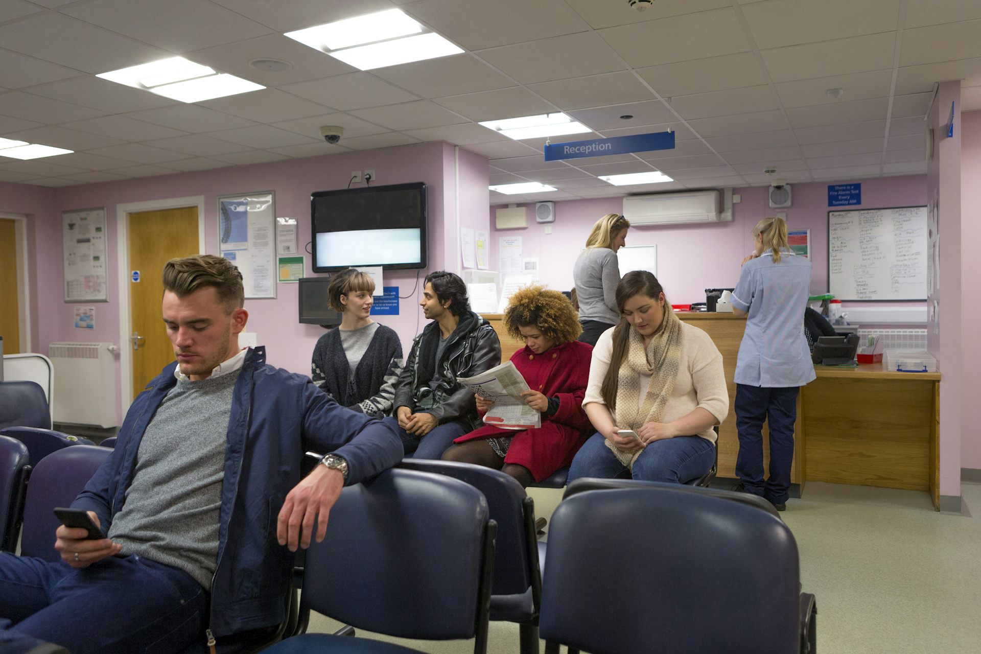 Patients in a doctor's waiting room