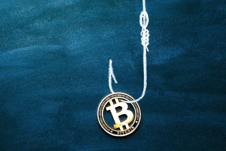 Illustration of a bitcoin token on a fishing hook