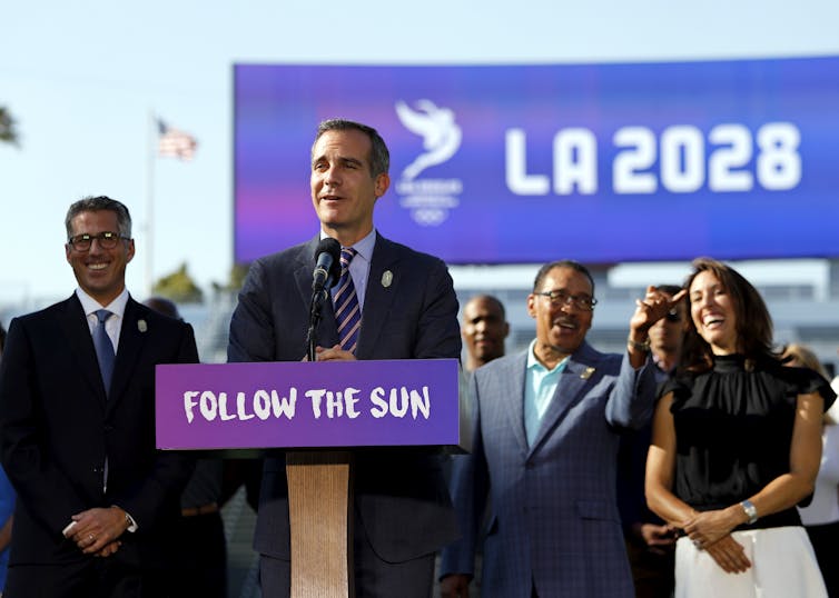 Eric Garcetti delivering a speech where he is announcing that Los Angeles will host the Olympics in 2028.