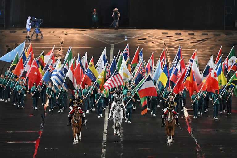 Flagbearers being led into the Trocadero during the opening ceremony of the Paris 2024 Olympic Games.