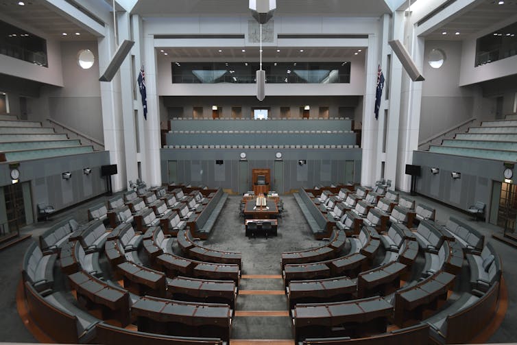An aerial review of the empty House of Representatives in Australian parliament