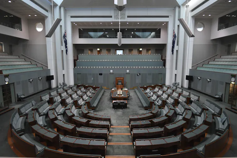 An aerial review of the empty House of Representatives in Australian parliament