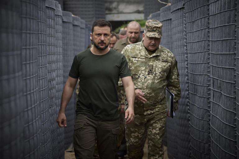 Ukrainian president Volodymyr Zelensky leads his troops through an underground tunnel.