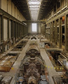 A huge hall containing machinery for a power station.