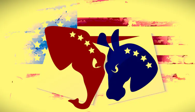 Red elephant and a blue donkey at loggerheads, with a faded American flag in background