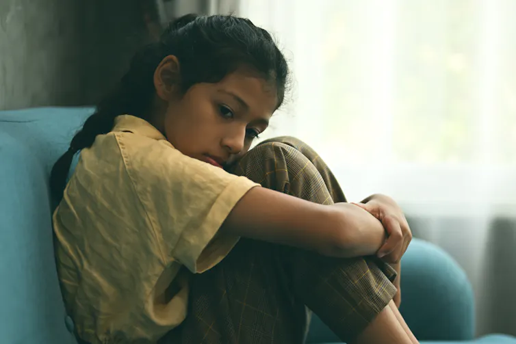 Girl looks sad