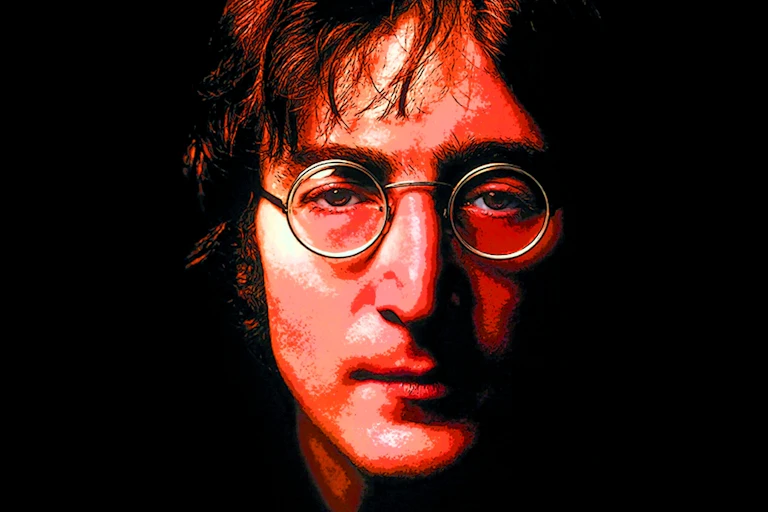 John Lennon with his signature round glasses