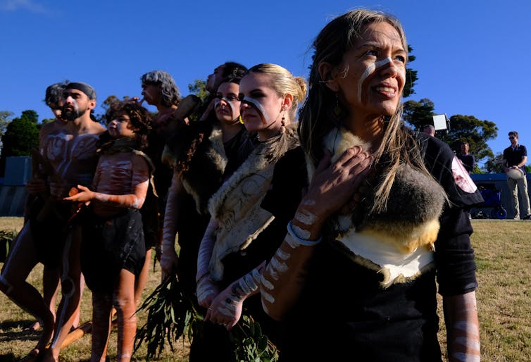Indigenous people performing a ceremony