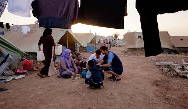 A Yazidi family in a camp for displaced people.