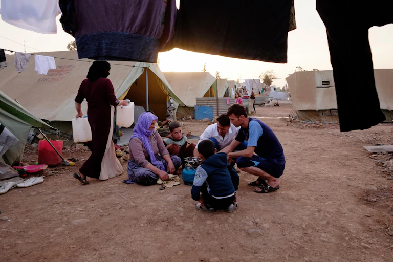 A Yazidi family in a camp for displaced people.