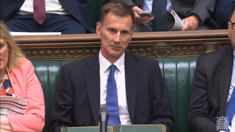 Jeremy Hunt sitting in the House of Commons