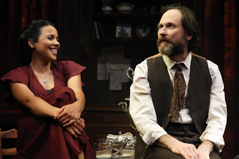 A woman and a man on stage.