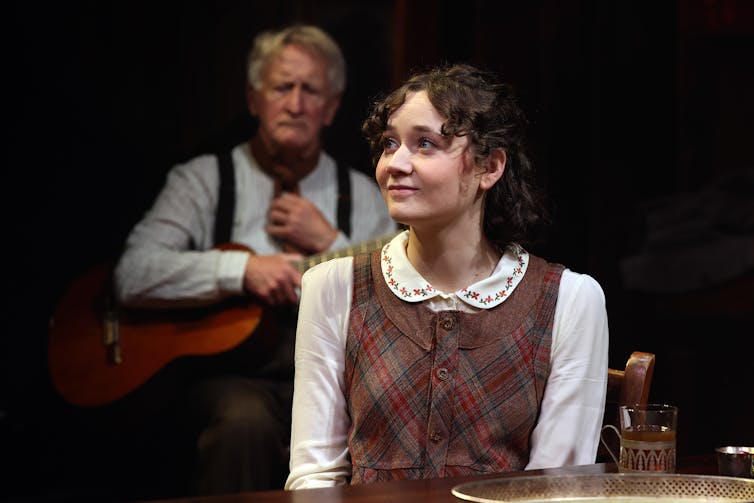 A young woman on stage.