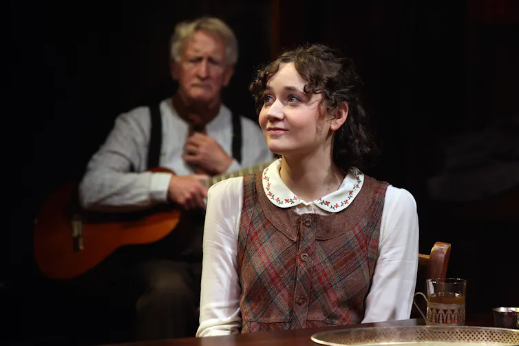 A young woman on stage.