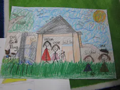 Colourful drawing of a family standing in the sunshine in front of their home with their pet dog, beneath a large tree.