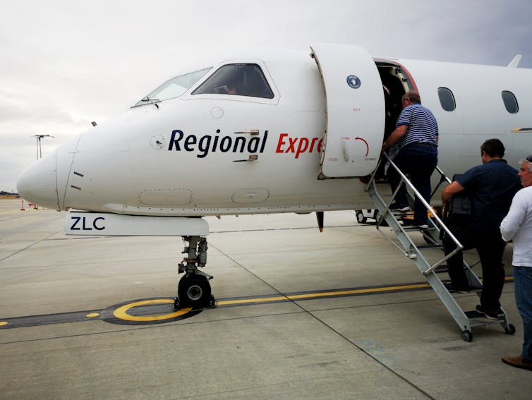 People boarding a Rex Airlines flight