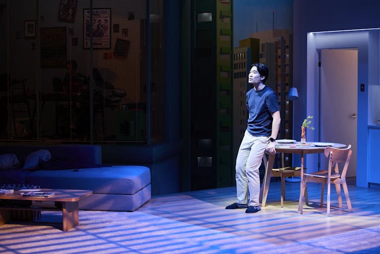 A man stands on stage.