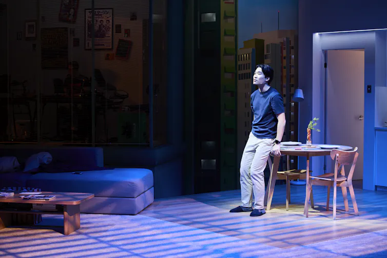 A man stands on stage.