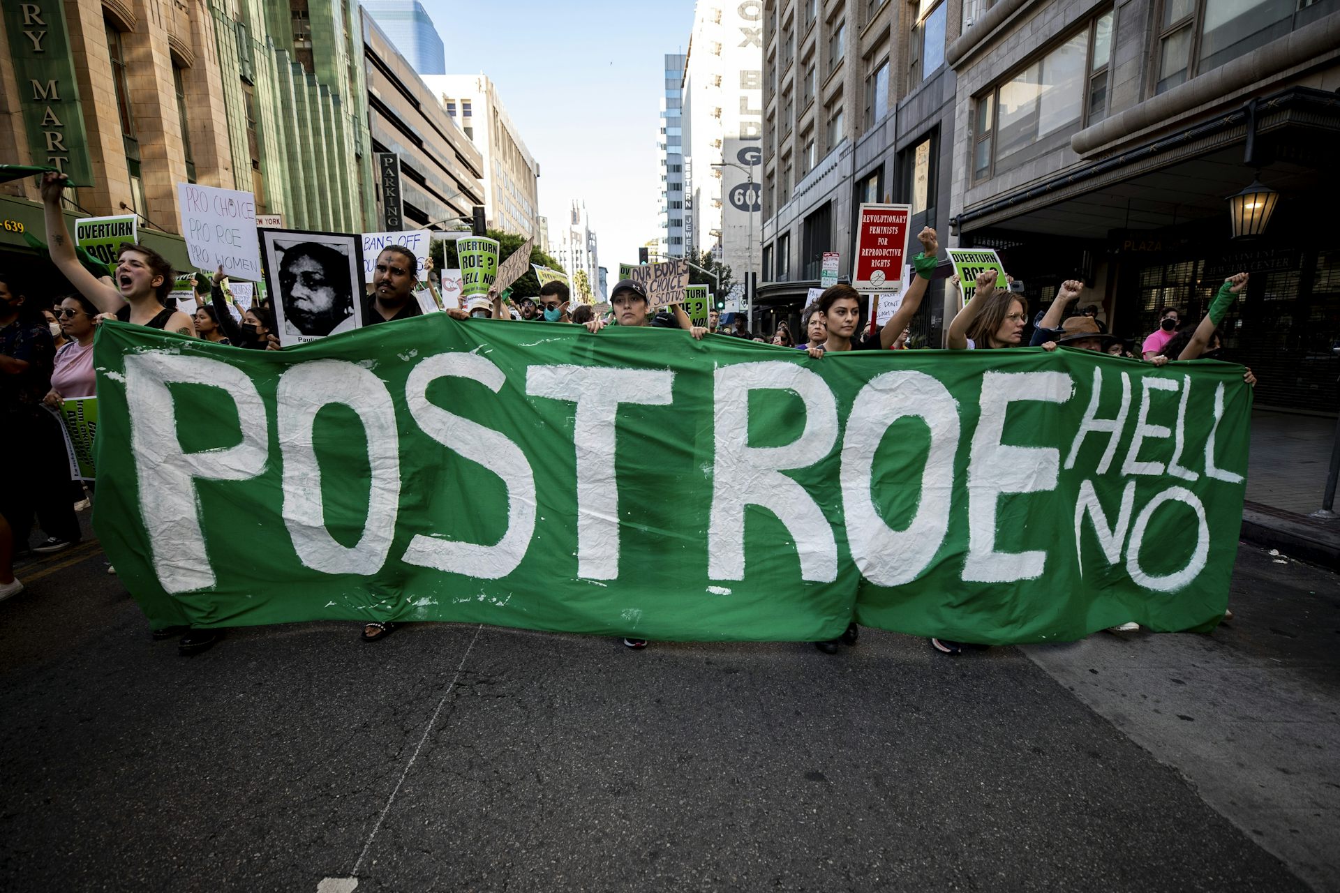 Pro-choice demonstrators protest in Los Angeles carrying a banner reading Post Roe Hell No