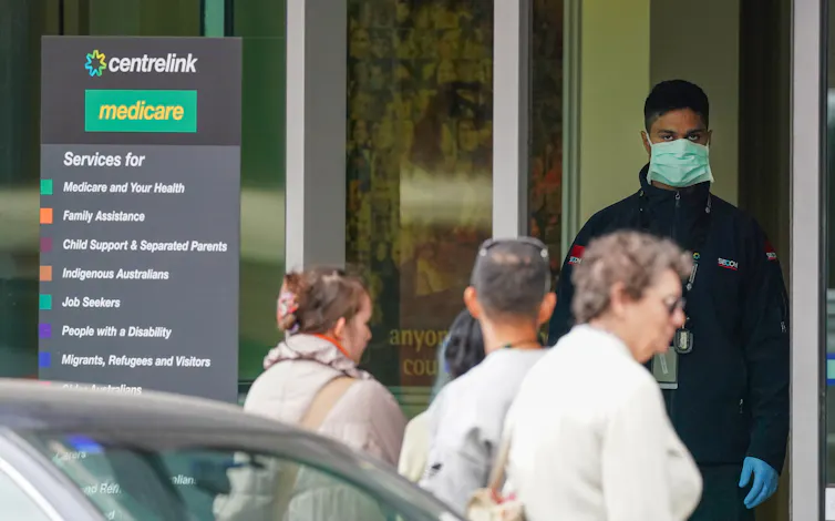 People standing outside an office