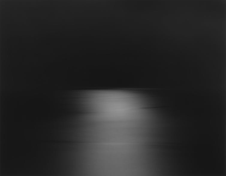 An almost completely black image.