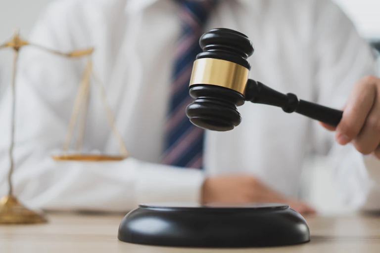 Closeup of judge holding gavel