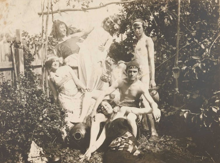 Photograph of children in dress-up.
