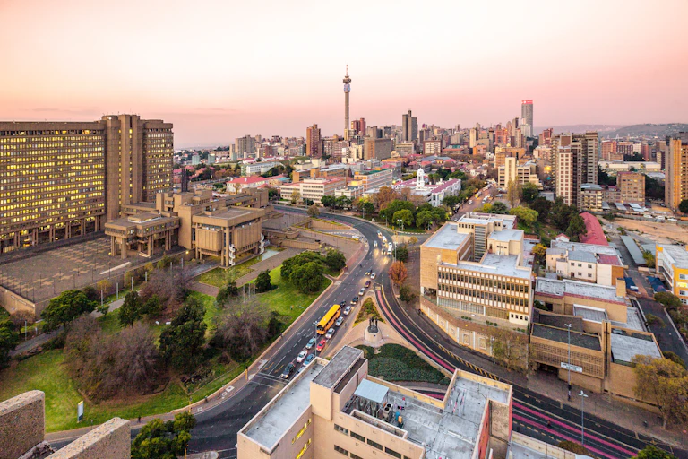 Sunset view of Johannesburg skyline and roads