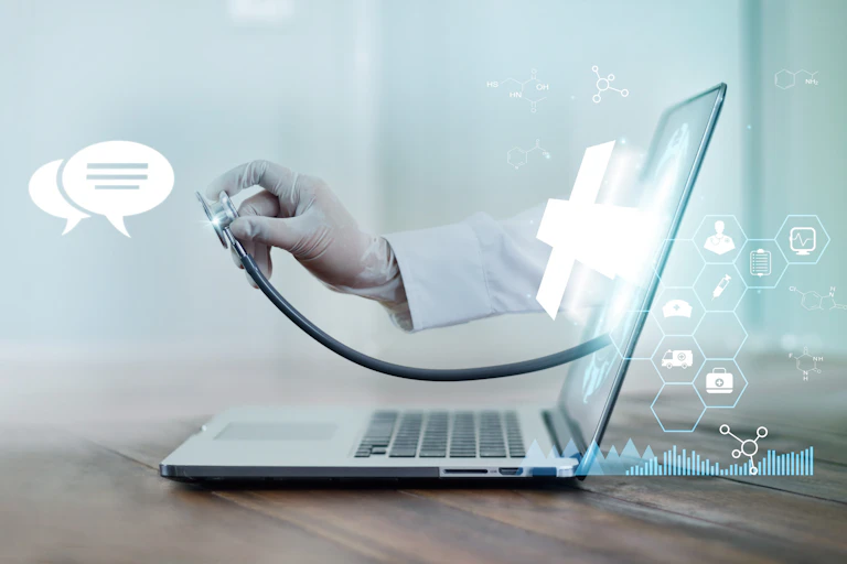 Virtual doctor concept, The doctor's hand with stethoscope protrudes from the laptop screen to examine the patient.