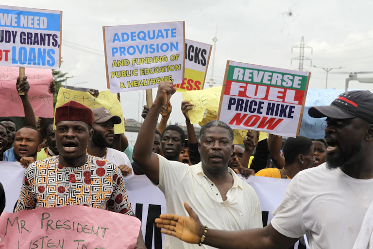A group of people with placards