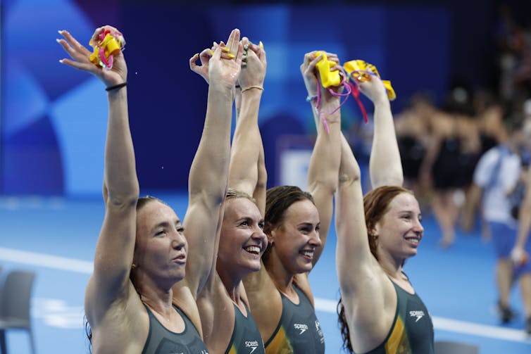 Lani Pallister, Ariarne Titmus, Brianna Throssell and Mollie O'Callaghan celebrate their win in the women 4x200m freestyle relay in Paris.