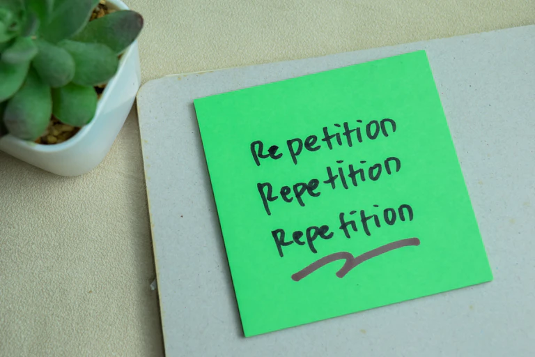 note saying repetition