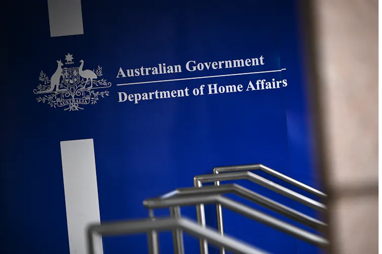 A blue building sign with the inscription “Department of Home Affairs”