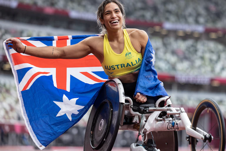 Madison De Rozario of Australia celebrates her marathon gold at Tokyo
