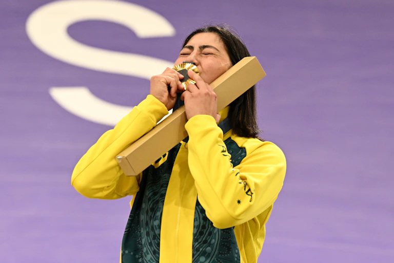 Saya Sakakibara of Australia celebrates her gold medal in the BMX racing