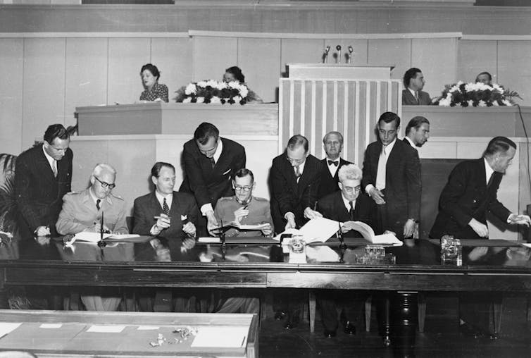 Signing of the Geneva Conventions in August 1949.