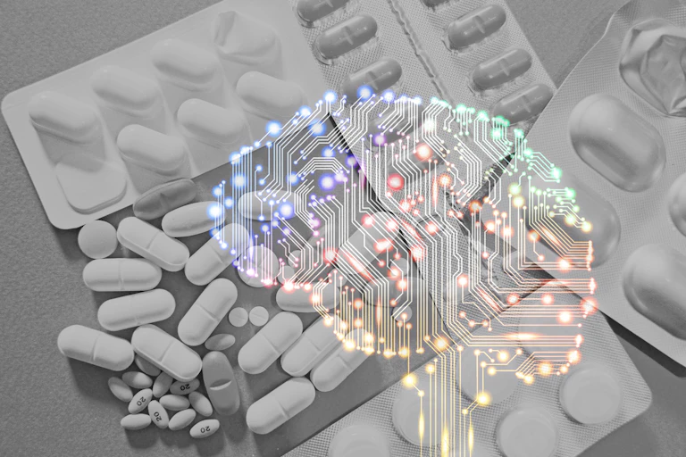 A diverse array of different-sized white pills lie on a gray background with a brain concept in the foreground.