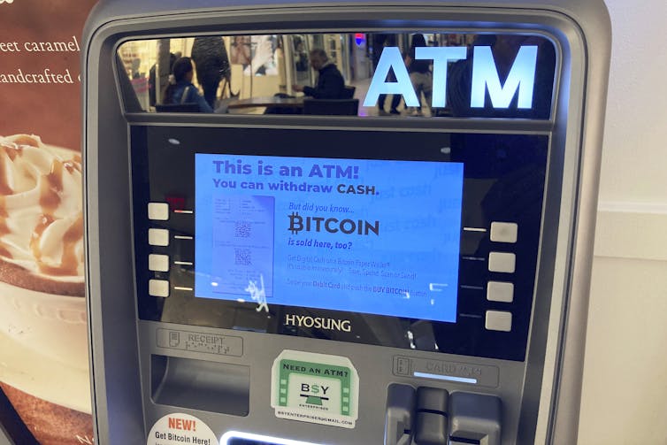 ATM machine with a screen that says Bitcoin