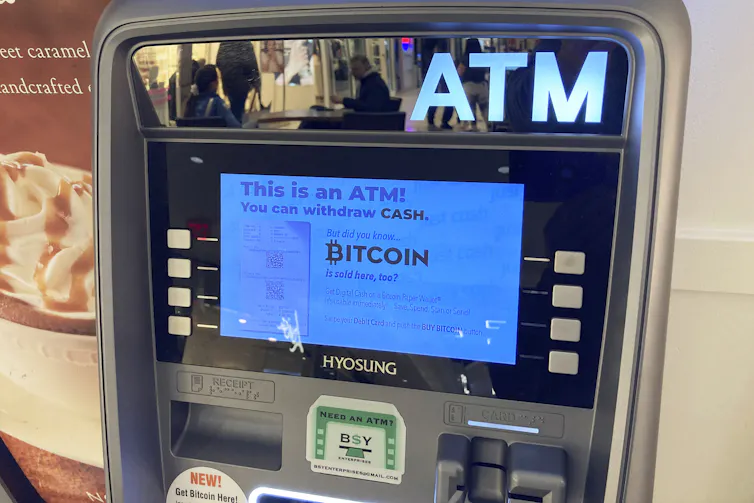ATM machine with a screen that says Bitcoin